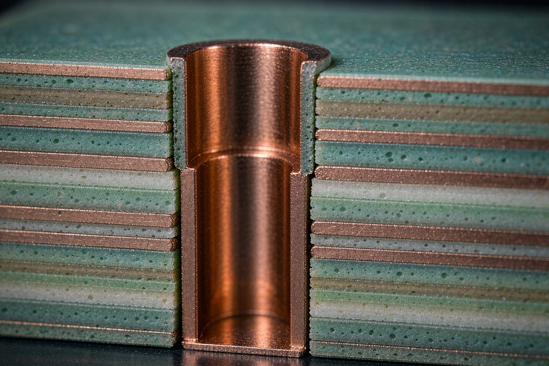 Microsection of a back-drilled via in a high-speed PCB showing the stub removed by counterboring above the target signal layer